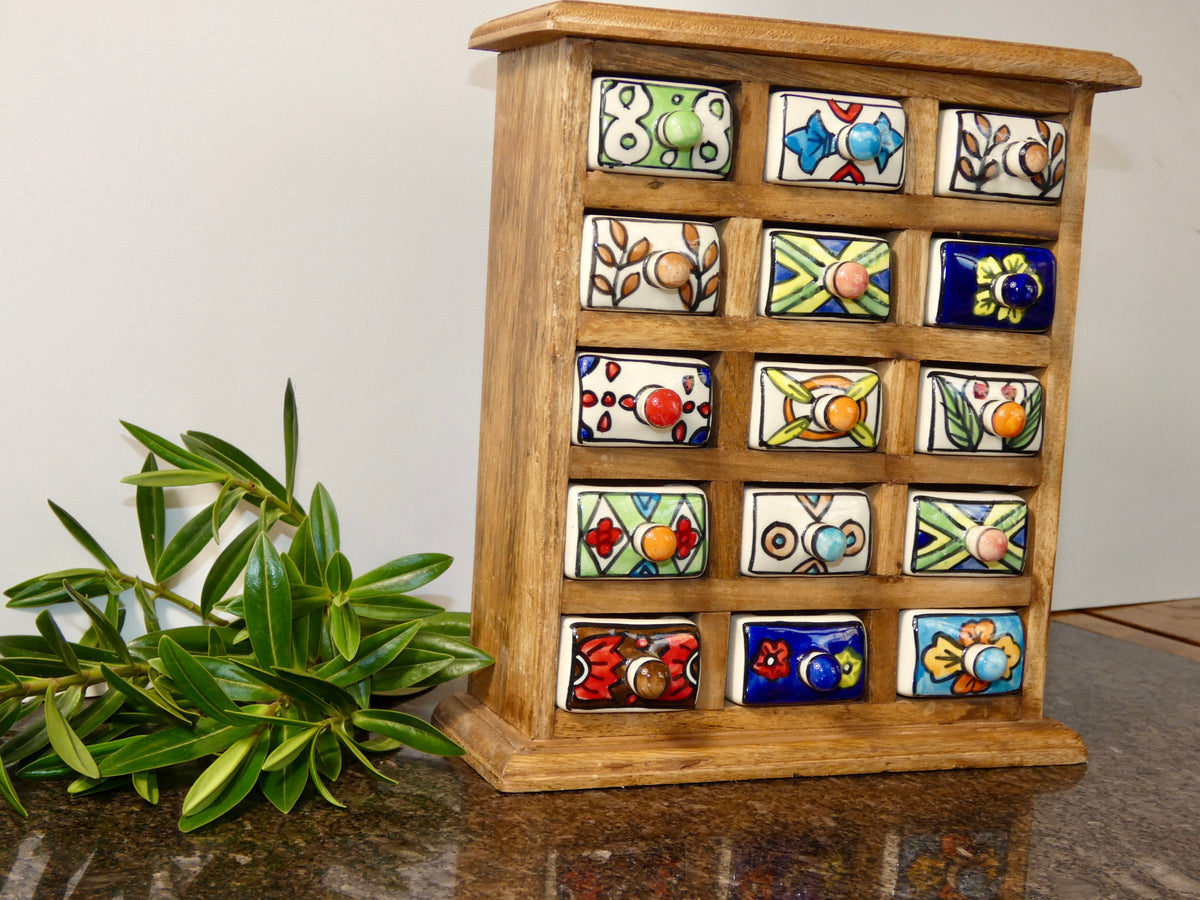 Wooden chest with 15 ceramic drawers