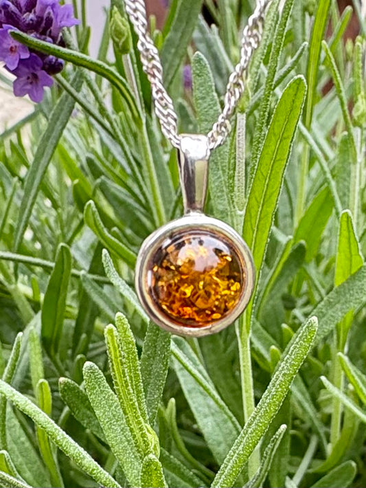 Small Round Amber Sterling Silver Pendant with Sterling Silver Chain.