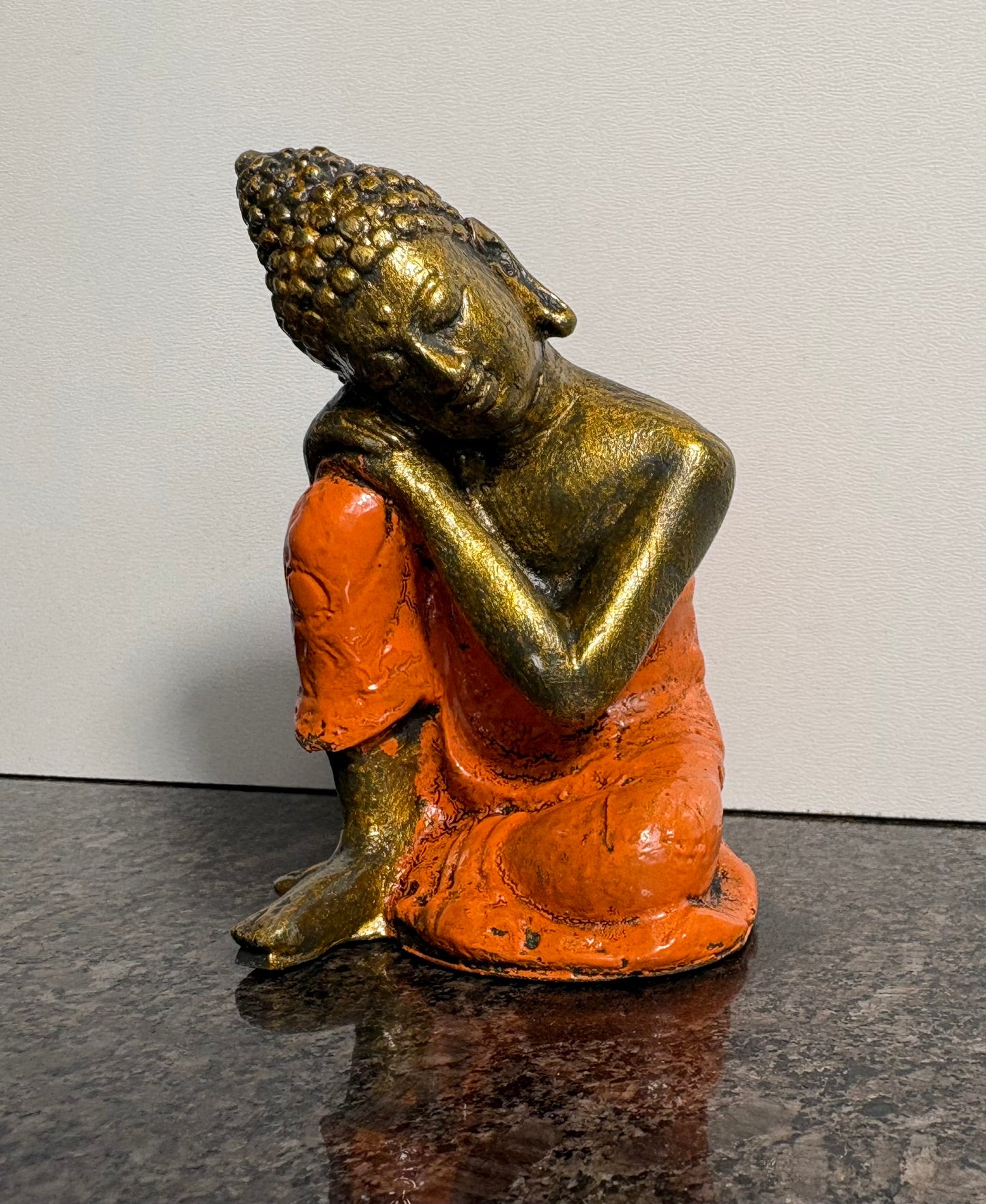 Resting Buddha Resin Figurine – Orange & Gold Meditation Ornament (9cm)